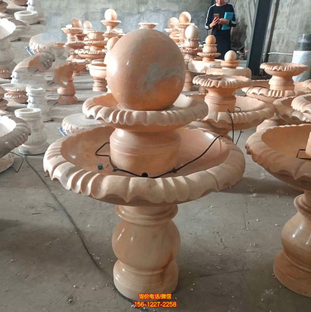 飯店室內風水球晚霞紅石雕